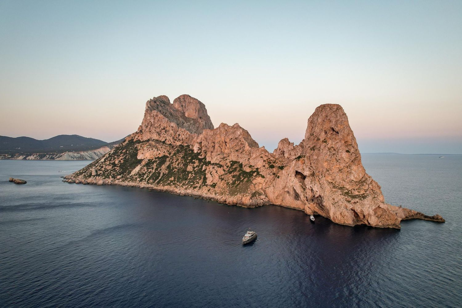 Es Vedra drone view at sunset by Ibiza wedding photographer Andrei Oprescu