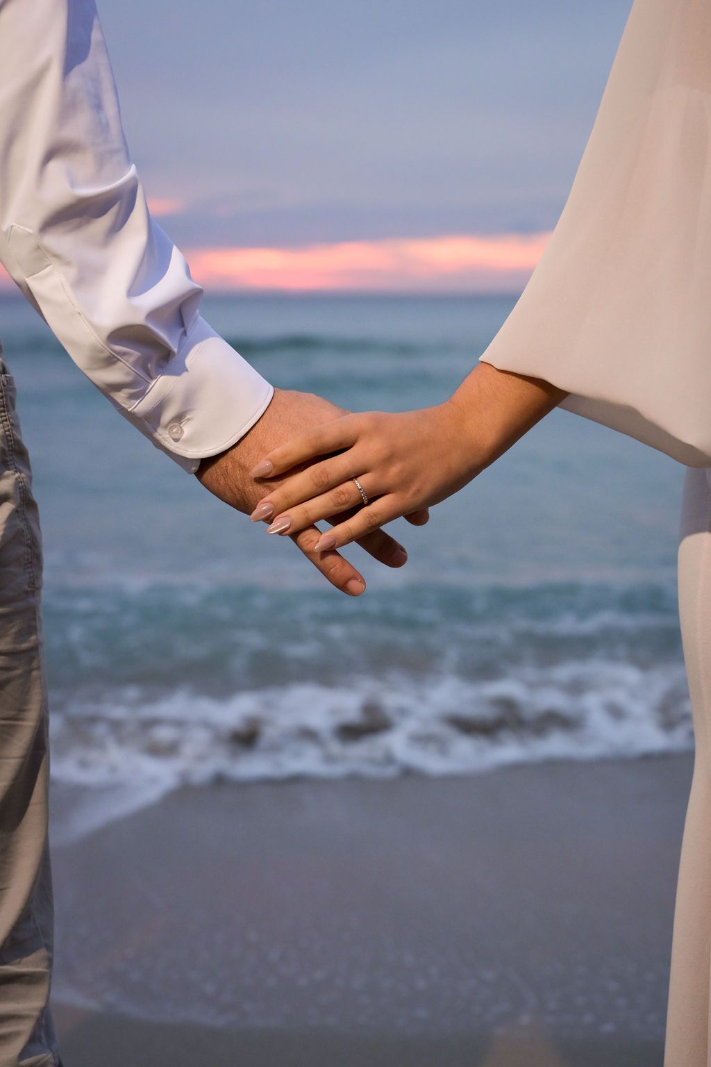 Engagement ring detail during Cala Tarida beach session in Ibiza