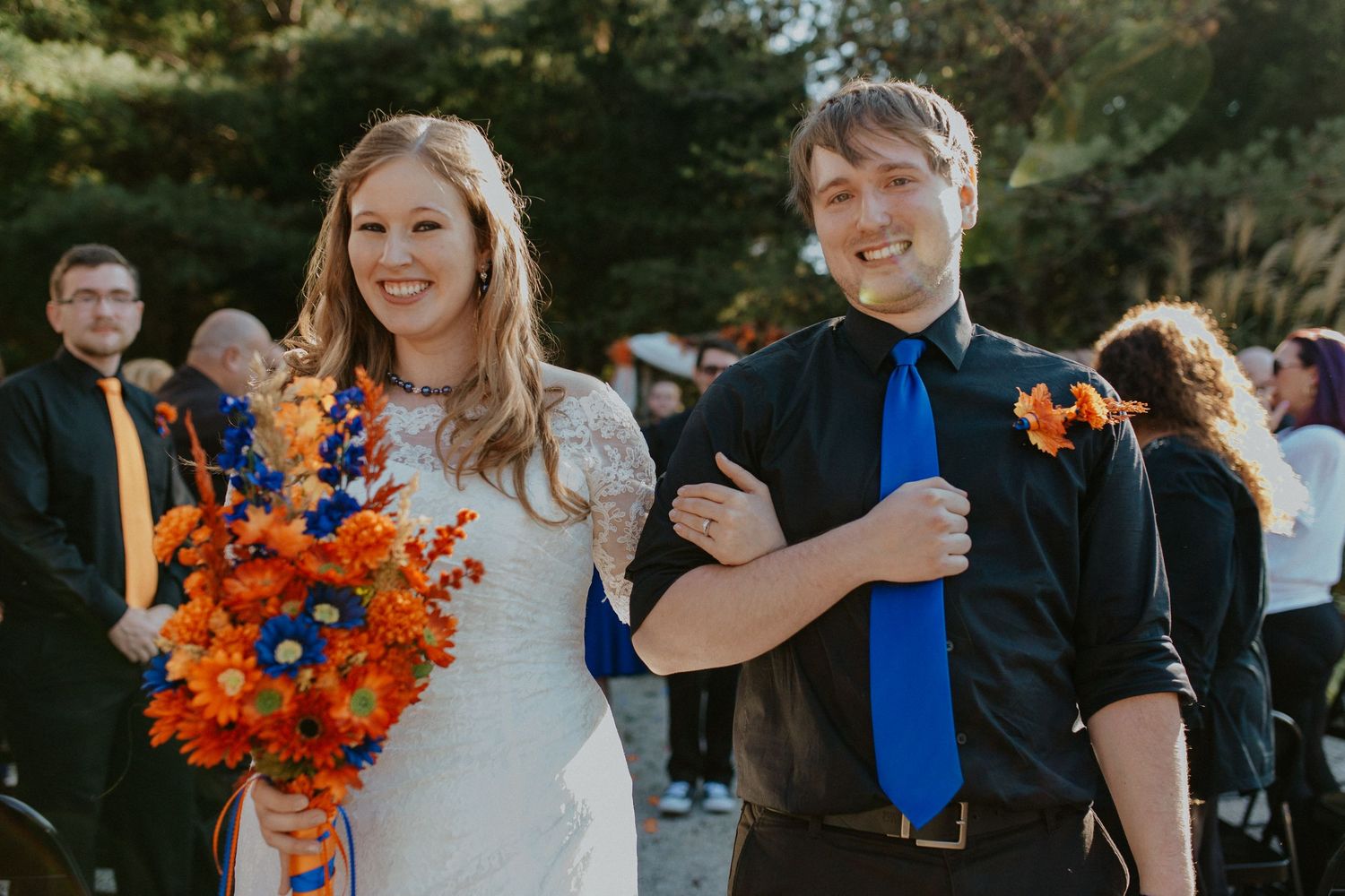 A collection of wedding party photos showing couples and guests with orange floral bouquets in an outdoor setting.