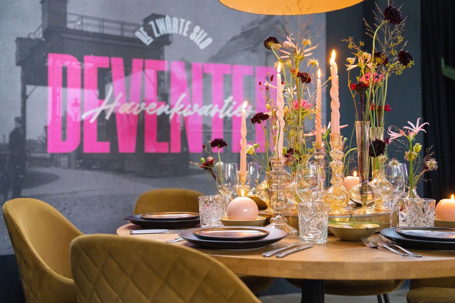 Elegant restaurant interior with plush velvet seating and warm ambient lighting creates a luxurious dining atmosphere.