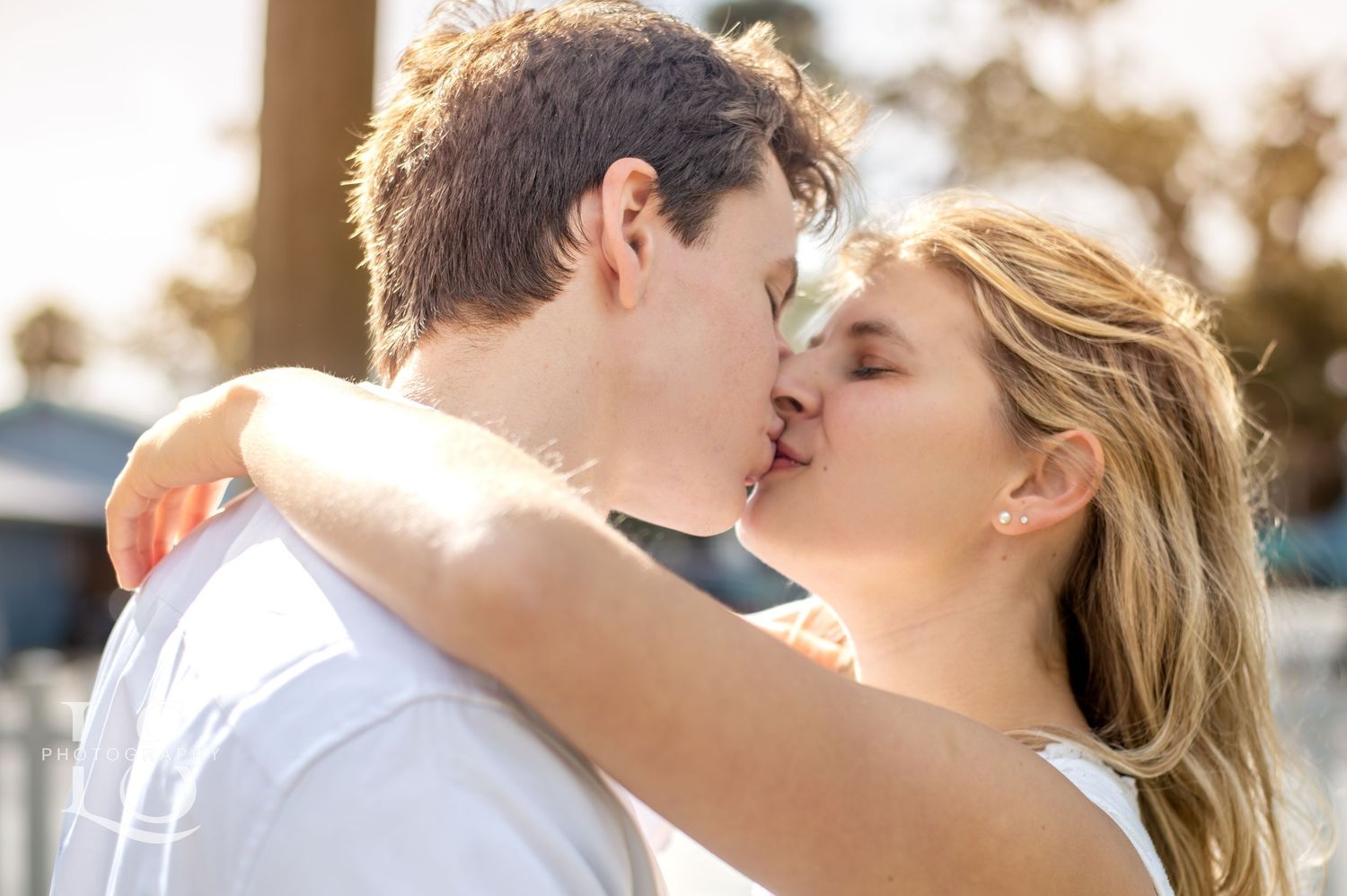 Sunset portrait session capturing romantic moment in golden light.