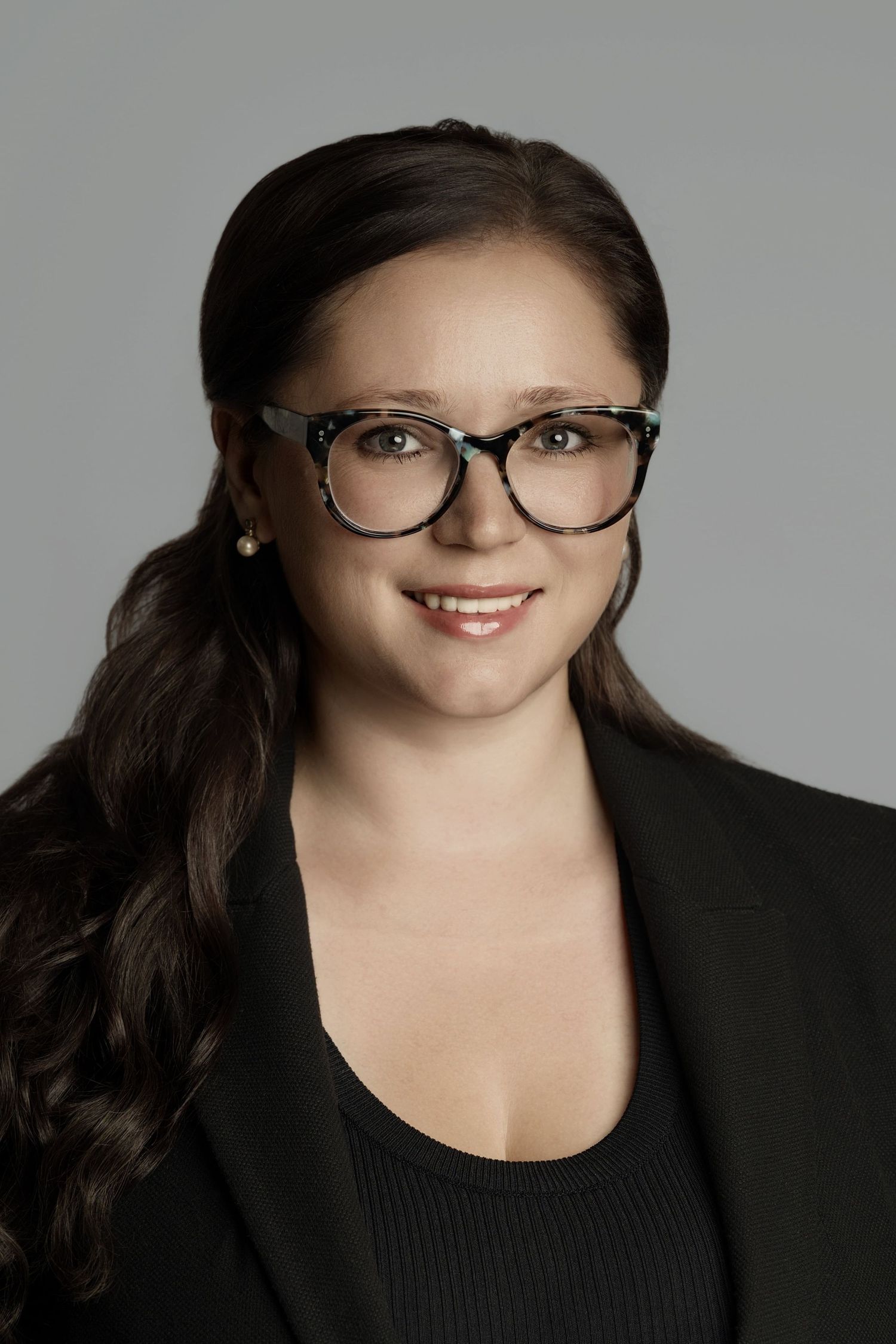 woman in glasses headshot