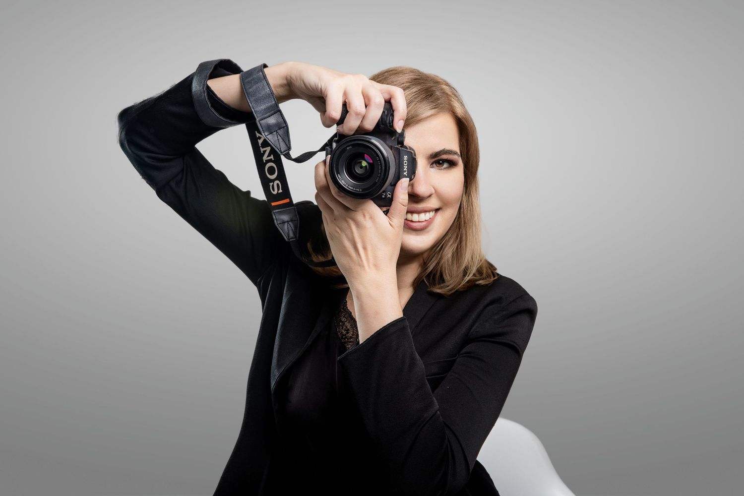 woman with Sony camera