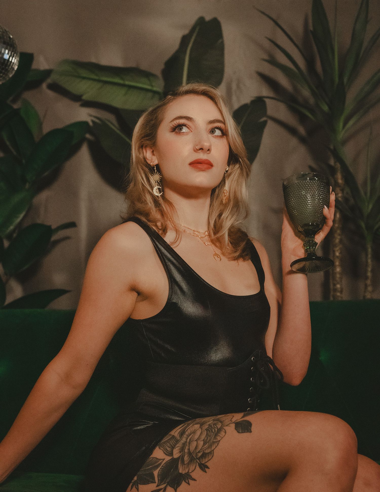 Portrait of a model in a creative photoshoot, showcasing a confident pose and expressive styling.