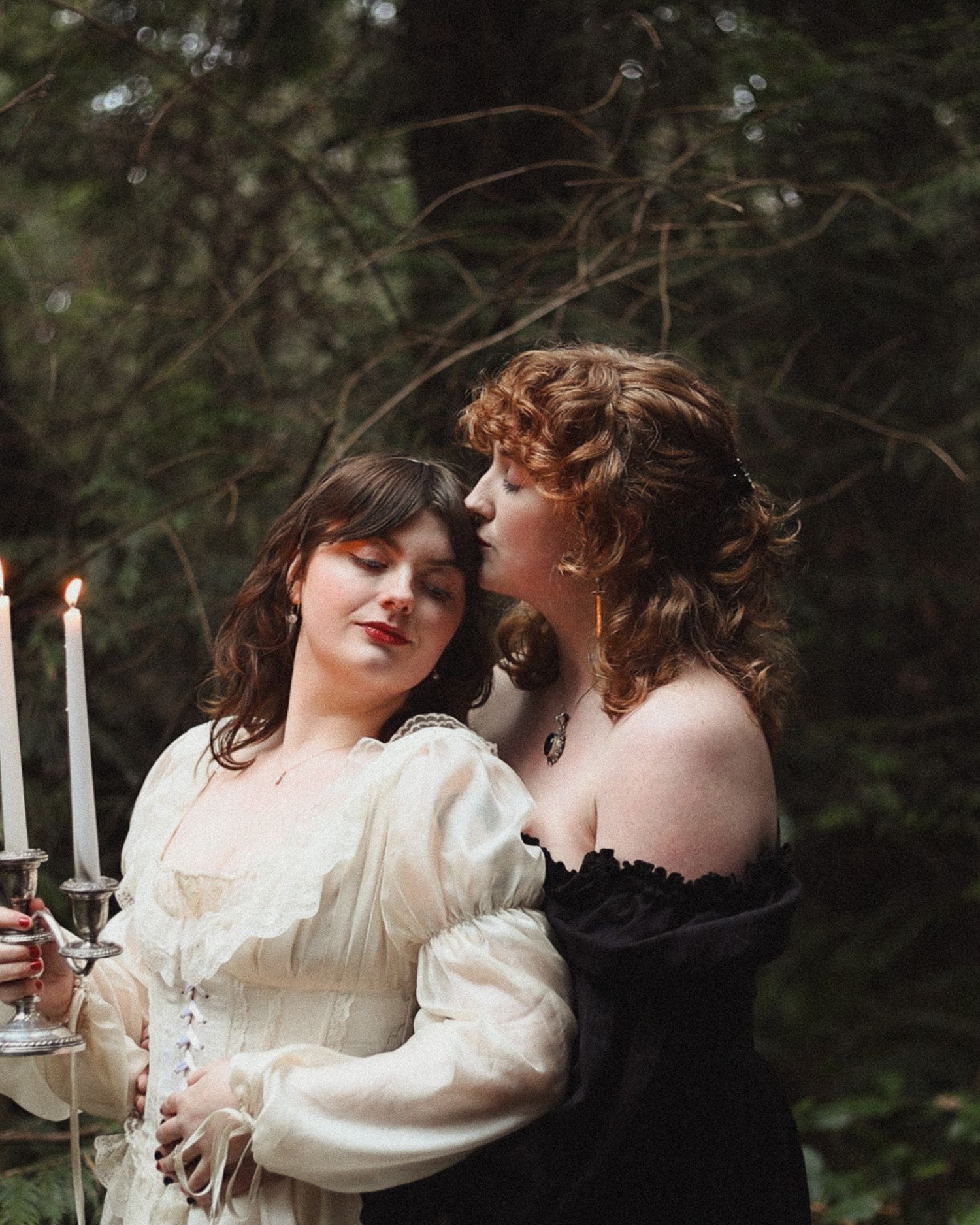 Couple posing together in a stylized photoshoot, embracing their unique bond and showcasing their personalities