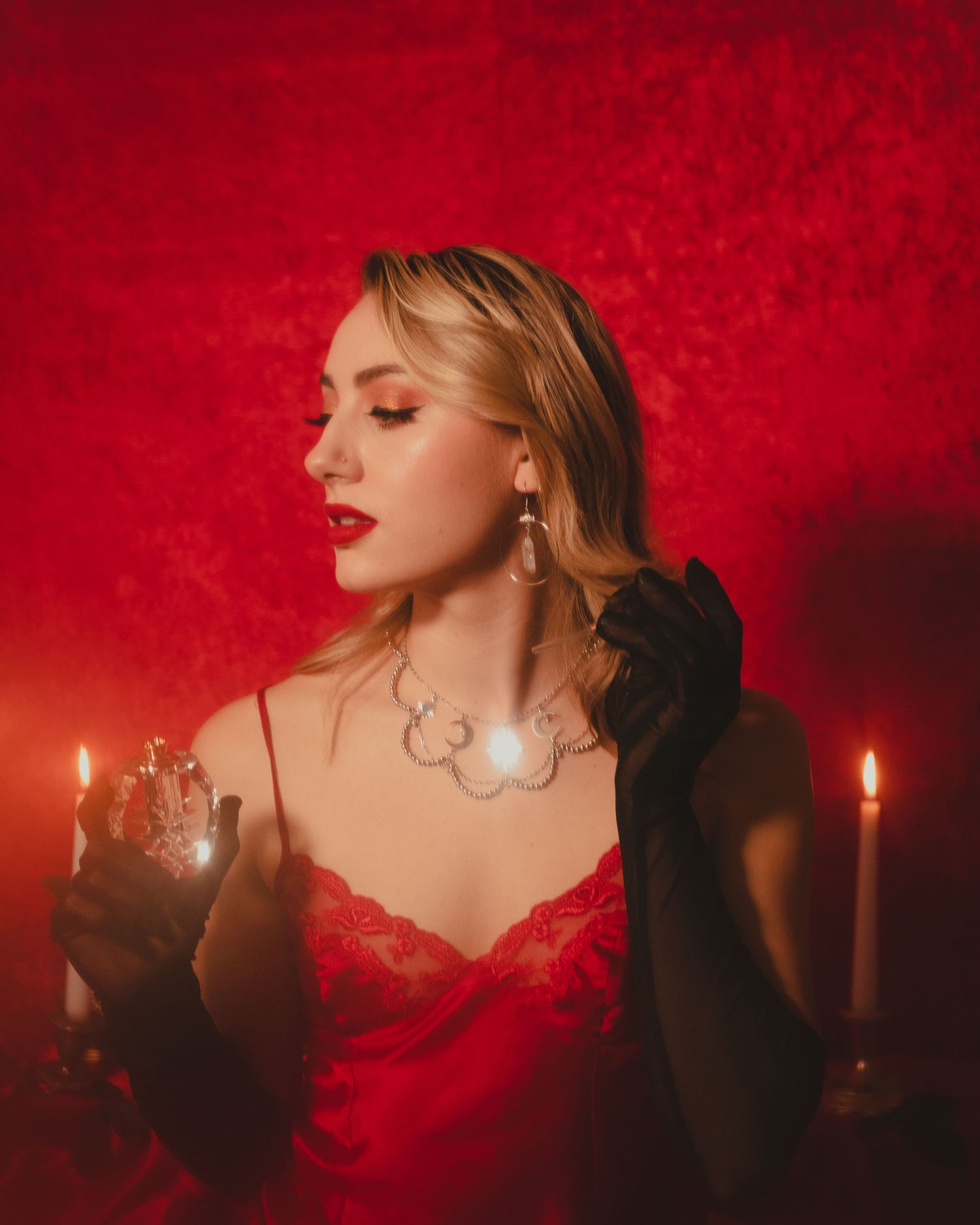 Model in a vintage-style gown, striking a graceful pose with a 1950s vibe, enhanced by natural lighting and vintage décor