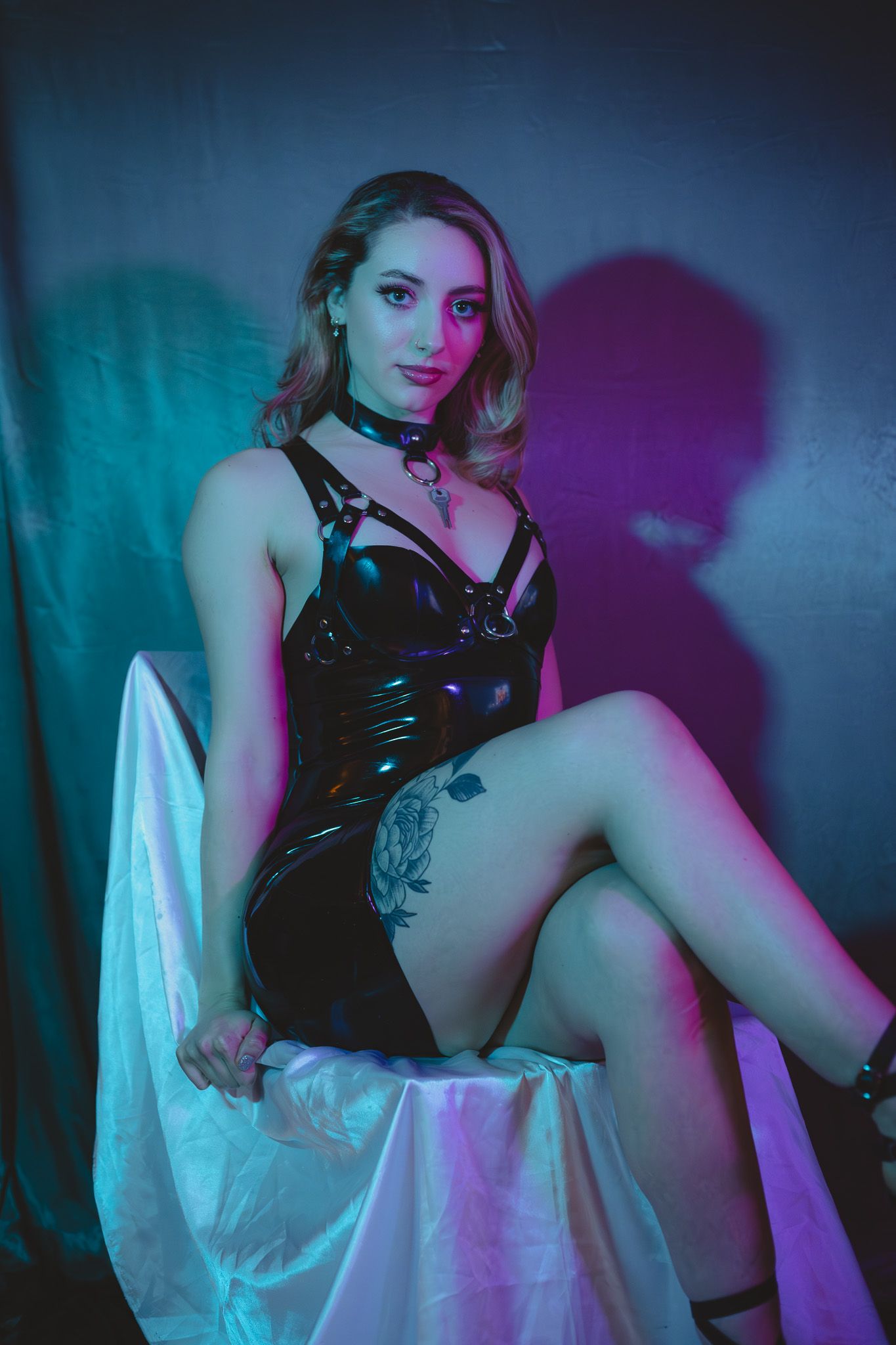 Boudoir photo of a model in lace lingerie, with soft, natural light illuminating their curves and creating a dreamy vibe