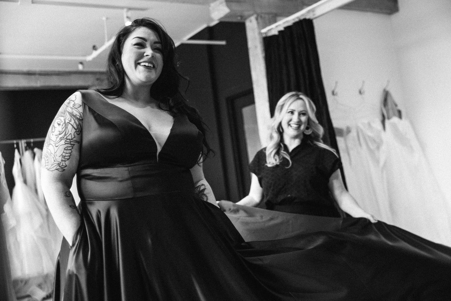 Black and white candid photography session in a professional studio setting.