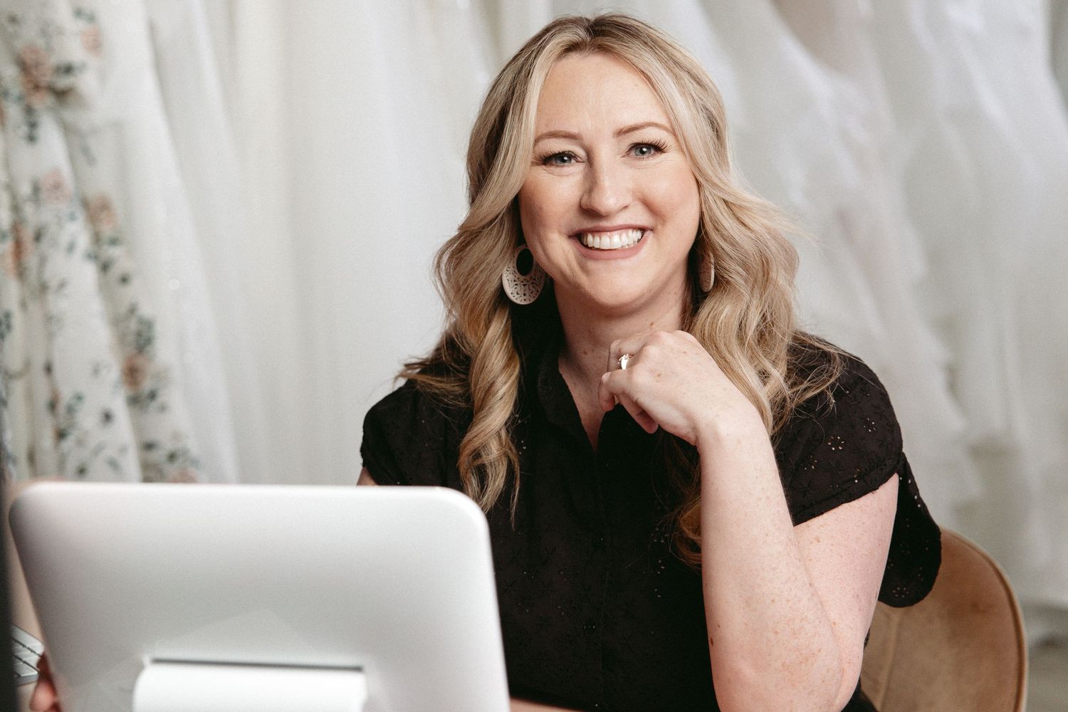 Series of casual studio portraits featuring someone in business attire against a light background with natural styling.