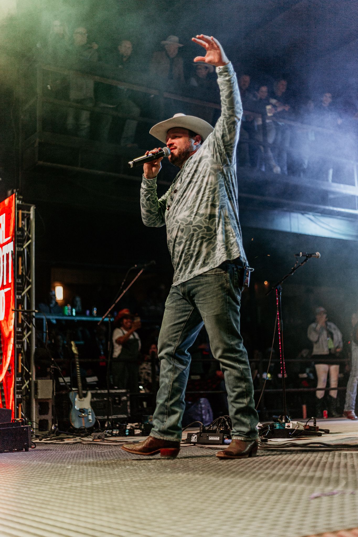 Josh Abbott band performing for a crowd.