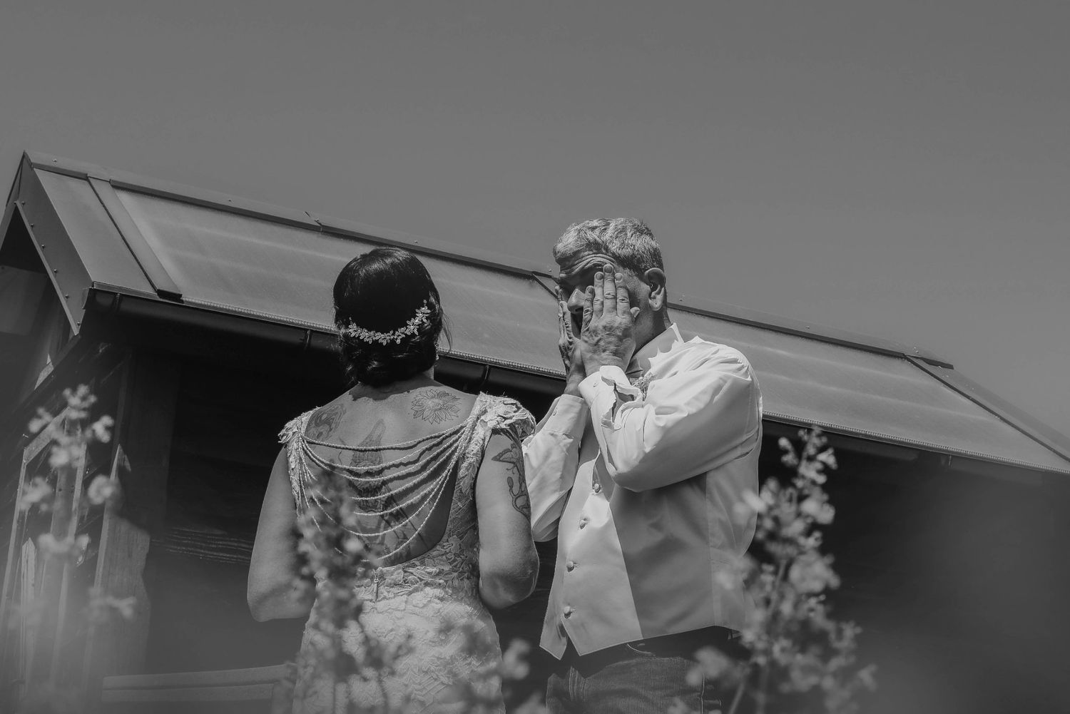 Black and white wedding ceremony photos showing intimate moments.