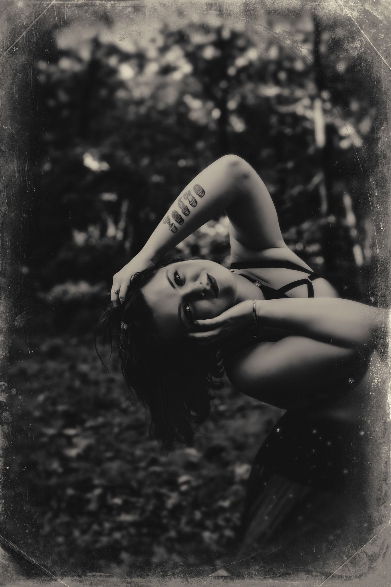 Dramatic black and white artistic portraits with vintage film effect.