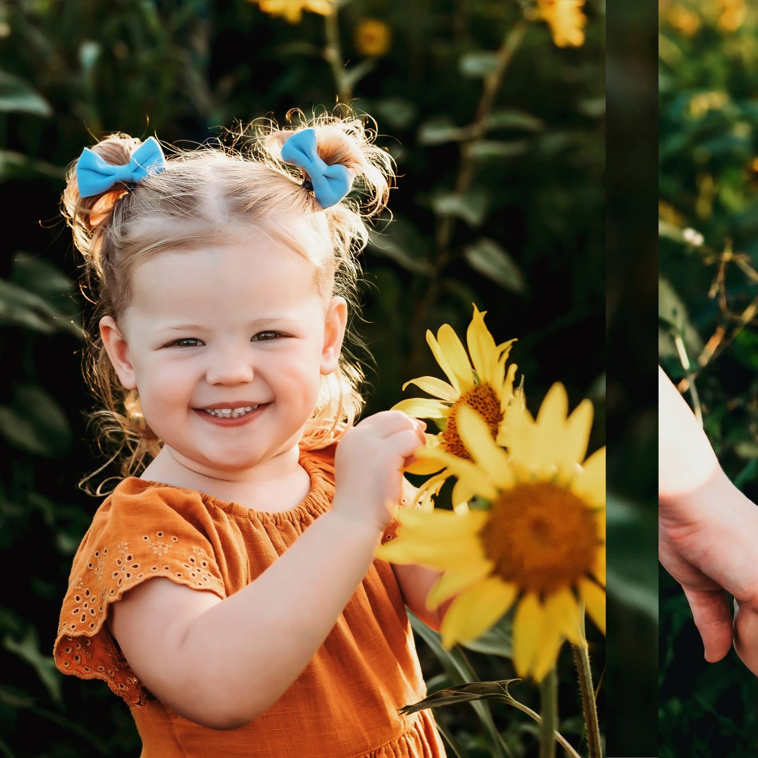 Child in orange dress playing among bright sunflowers in a garden.