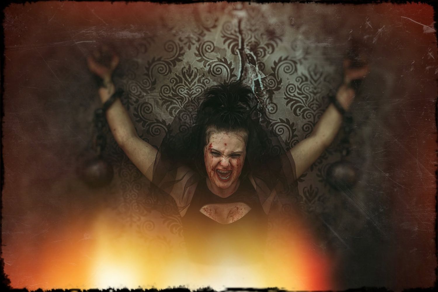 A fierce woman breaks free from chains amid flames, symbolizing liberation and strength in dramatic dark art.