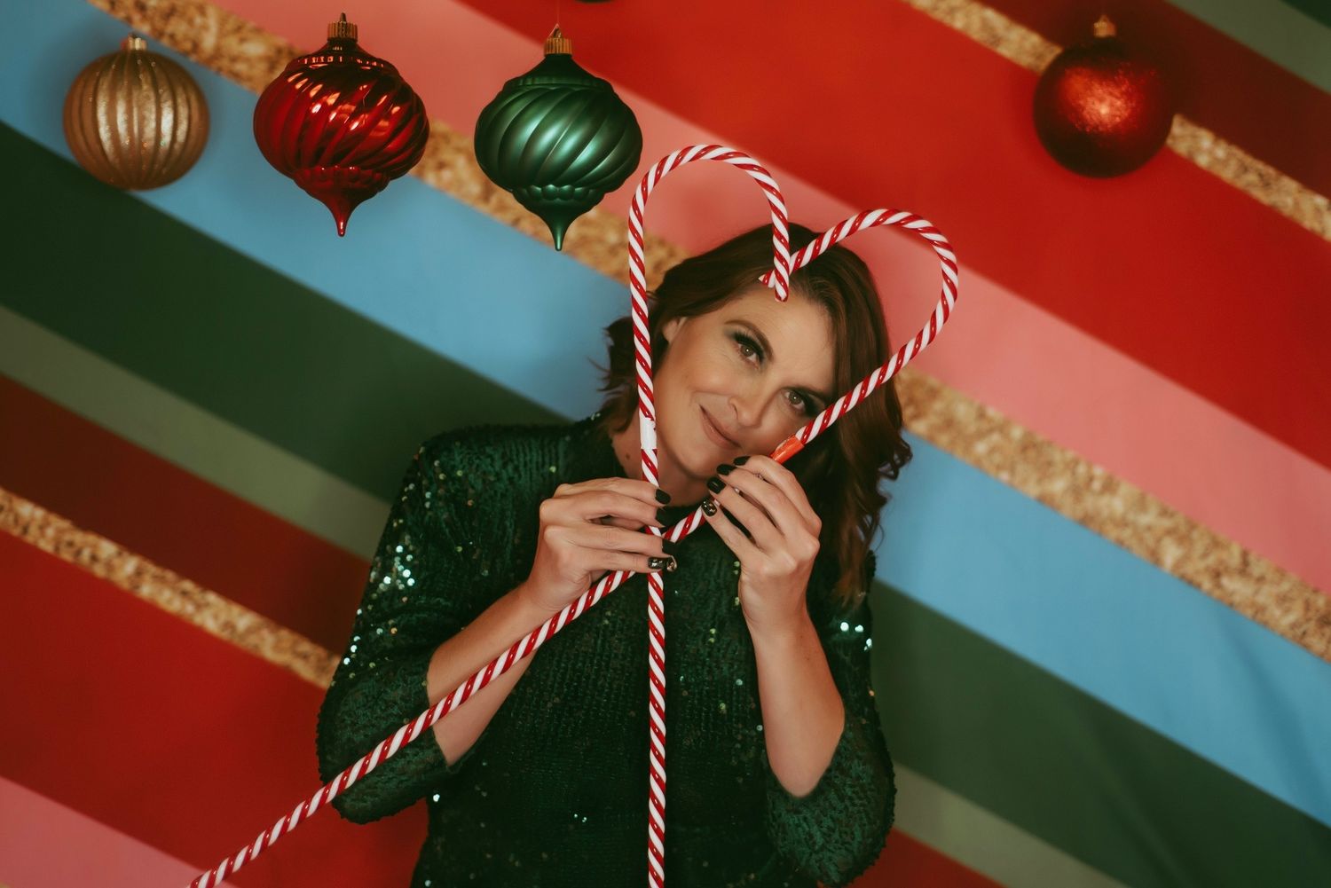 Holiday themed photos with candy canes and festive decorations against red and blue backgrounds.
