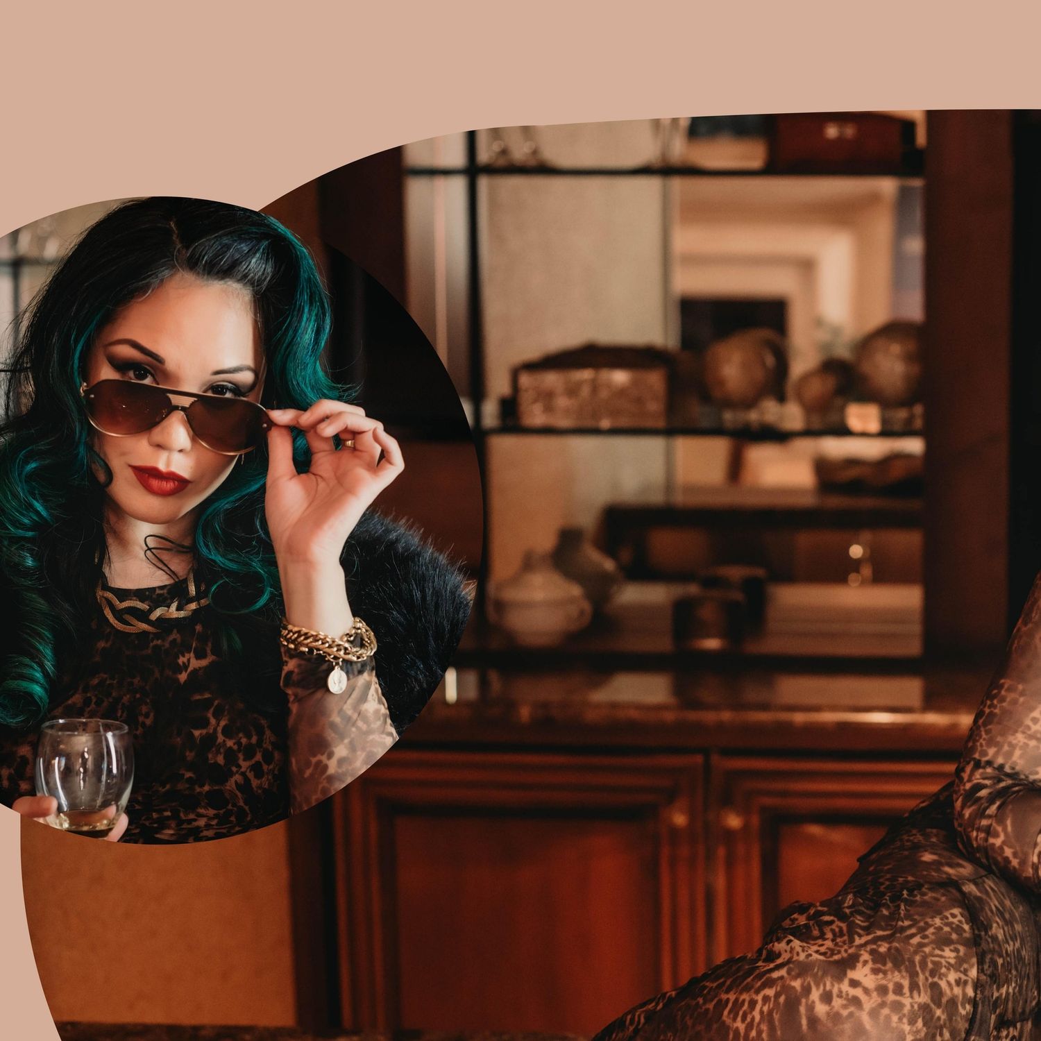 A woman in a lace dress poses with sunglasses in a moody, vintage-styled indoor setting.