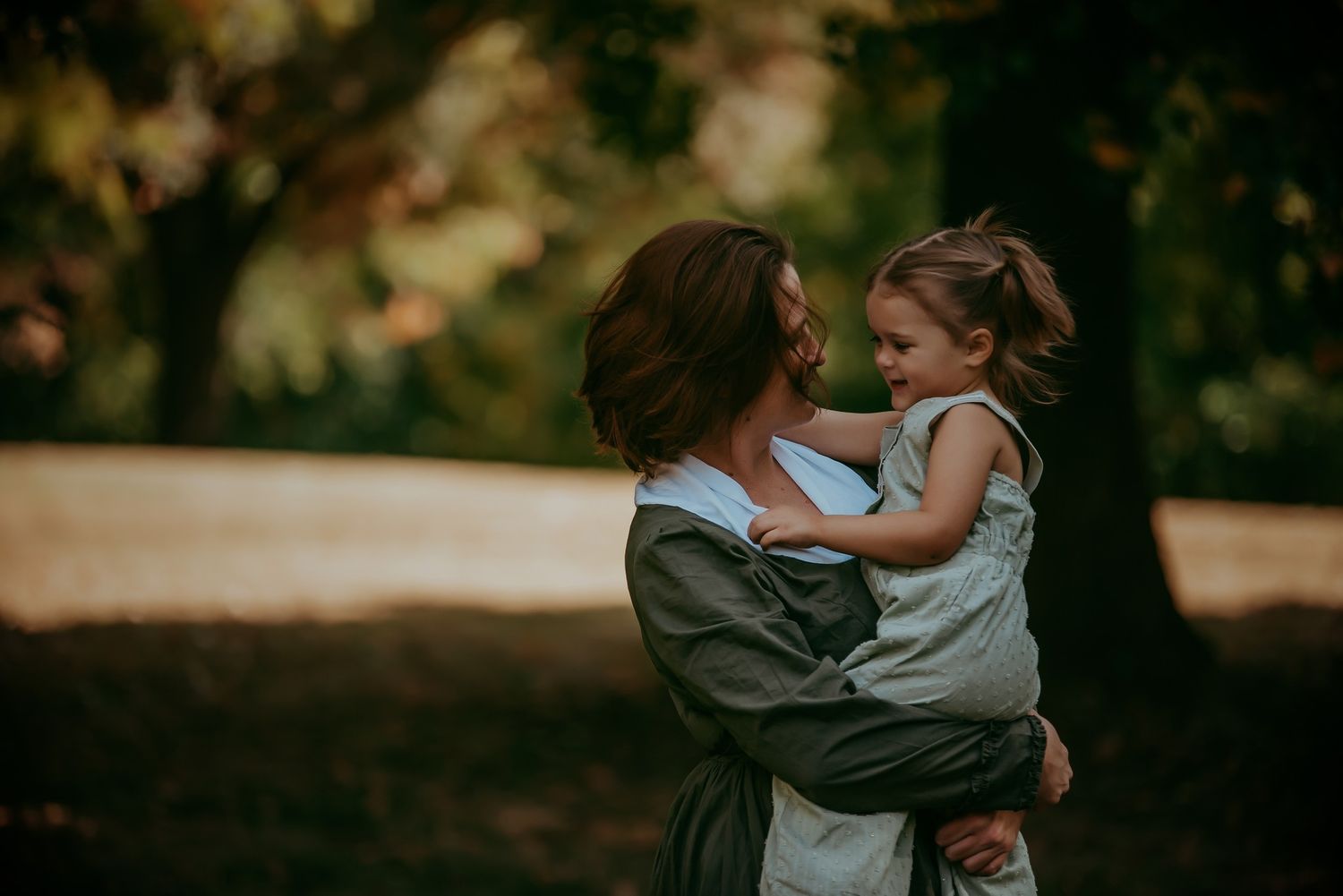 Outdoor photo sequence showing intimate moments in natural lighting at dusk.