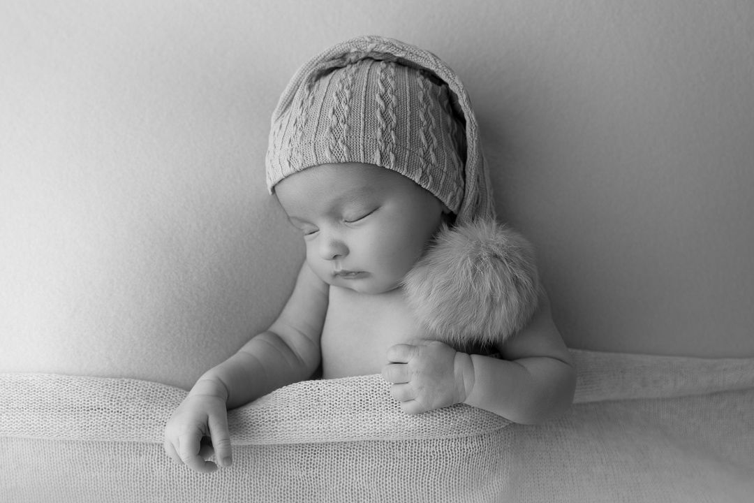 bébé endormi séance photo naissance Jura