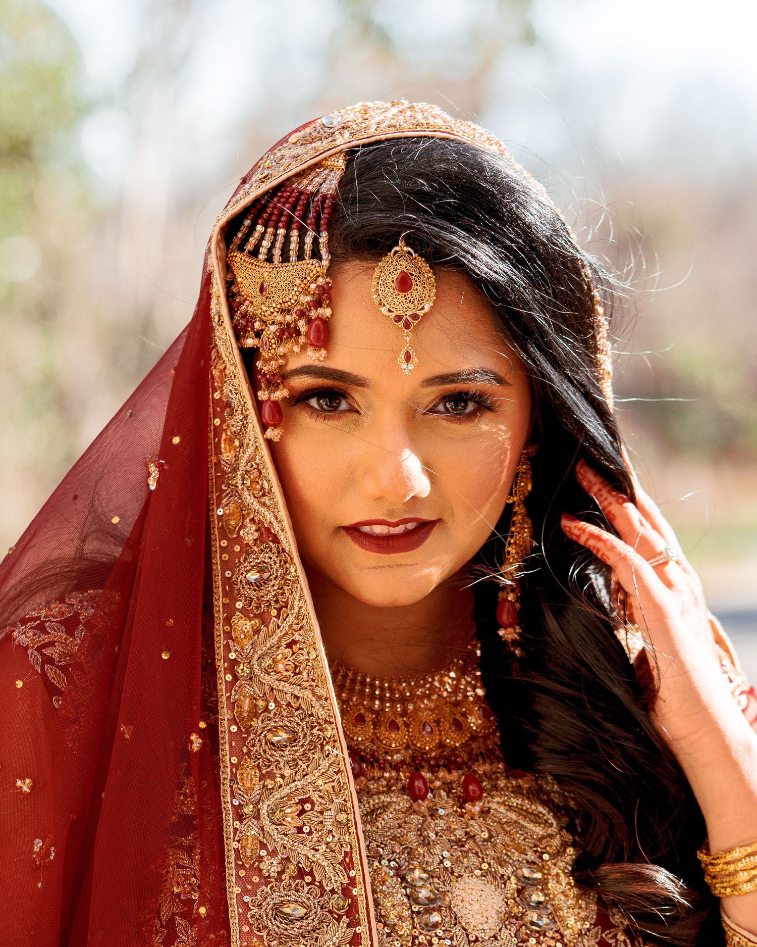 Traditional Indian bridal jewelry and attire showcased in a series of detailed close-up photographs.
