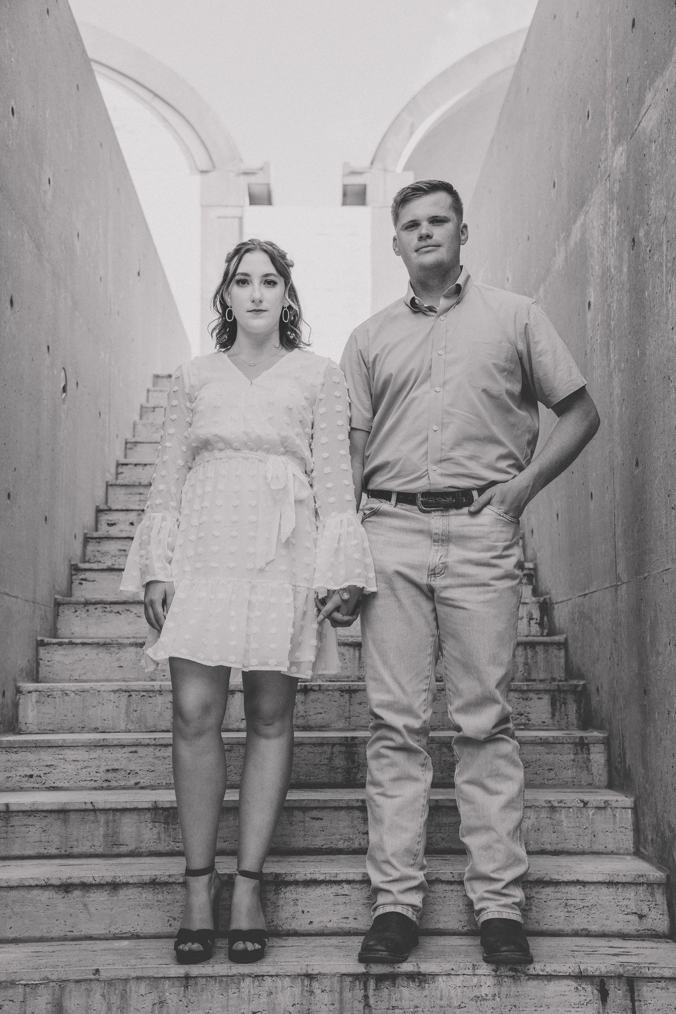 A series of vintage black and white photos showing two people sitting on stone steps in different poses.