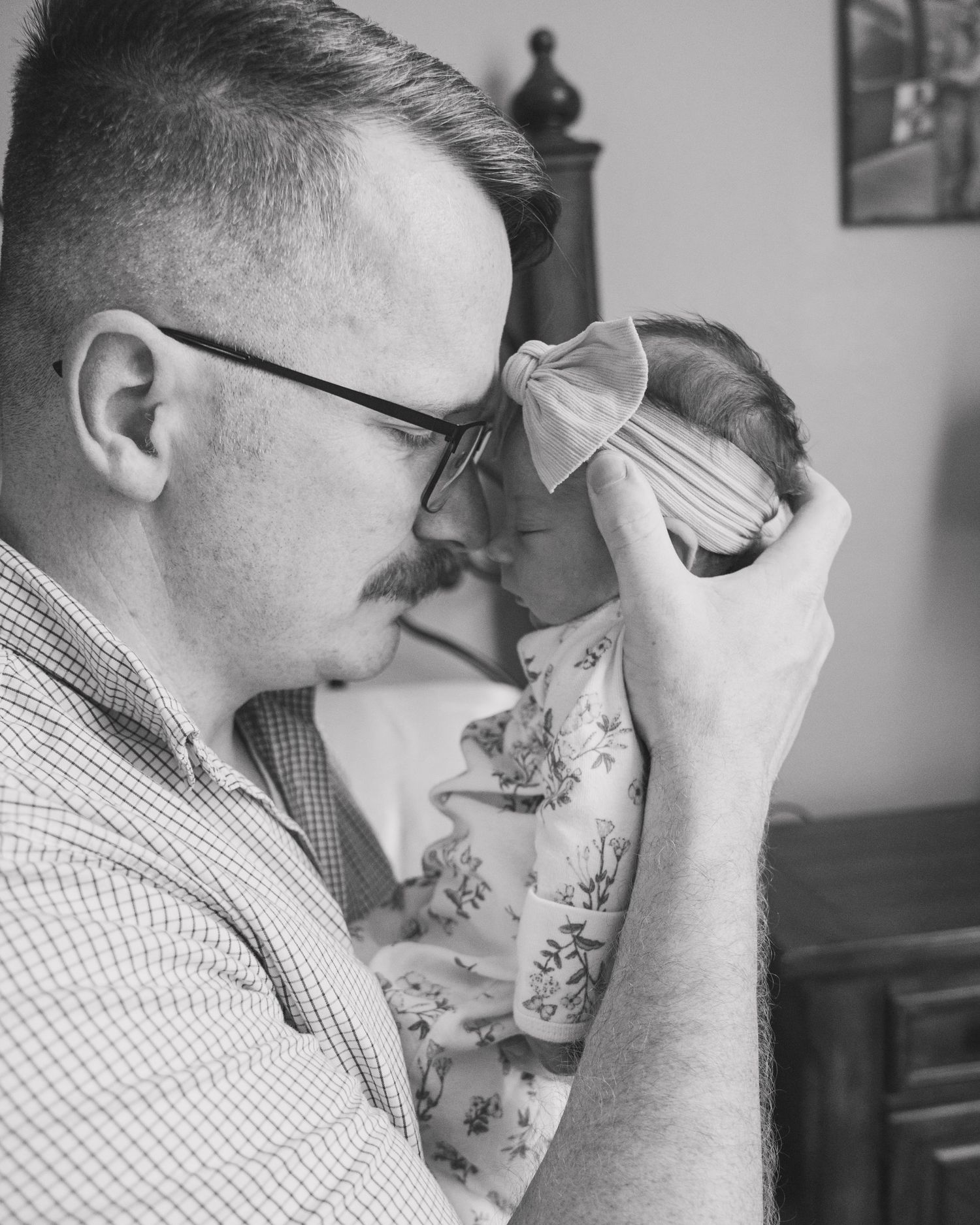 A series of black and white photos showing someone drinking from a glass in a progressive sequence.