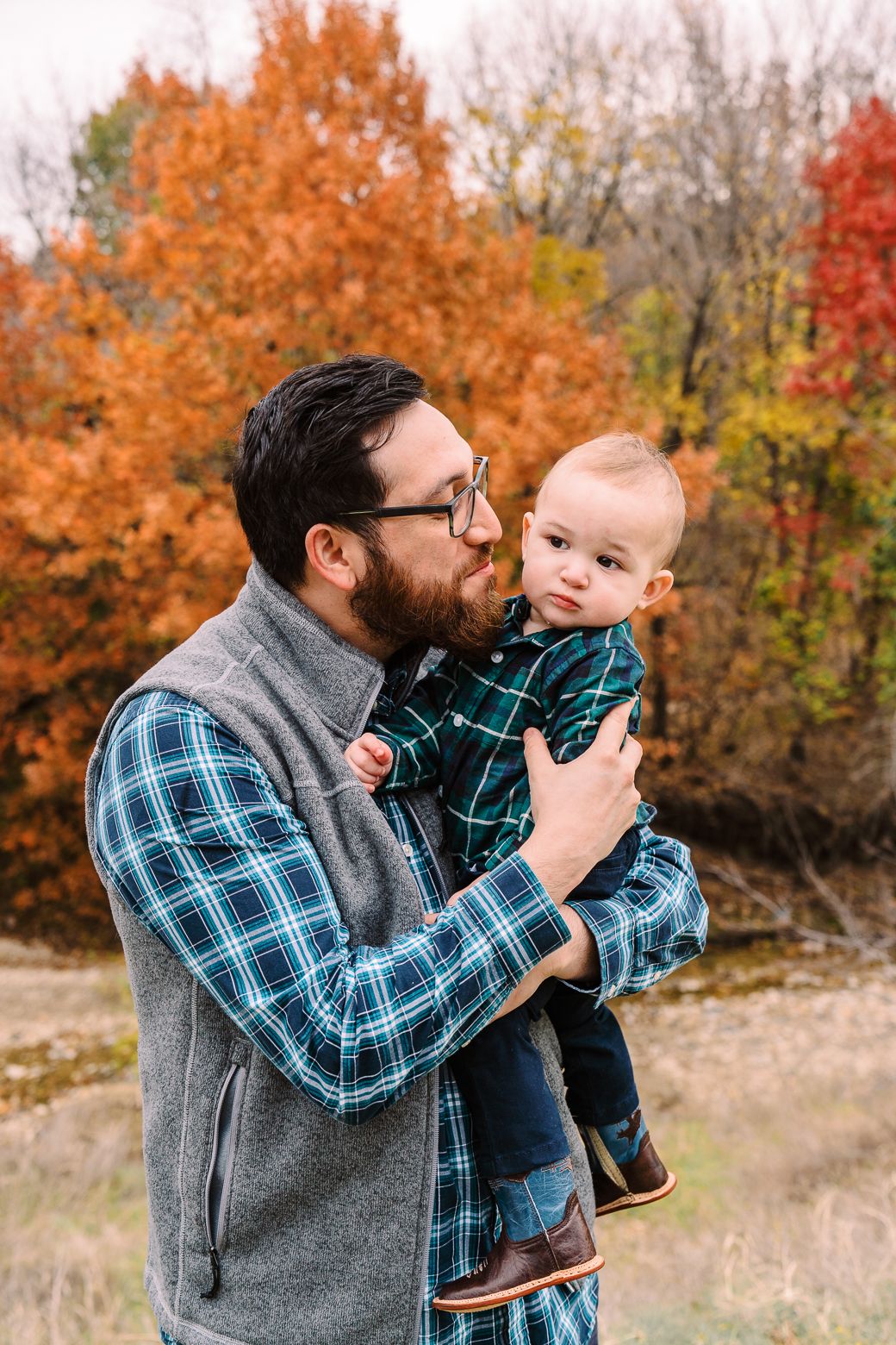 A sequence of playful interactions set against vibrant orange and red autumn trees.
