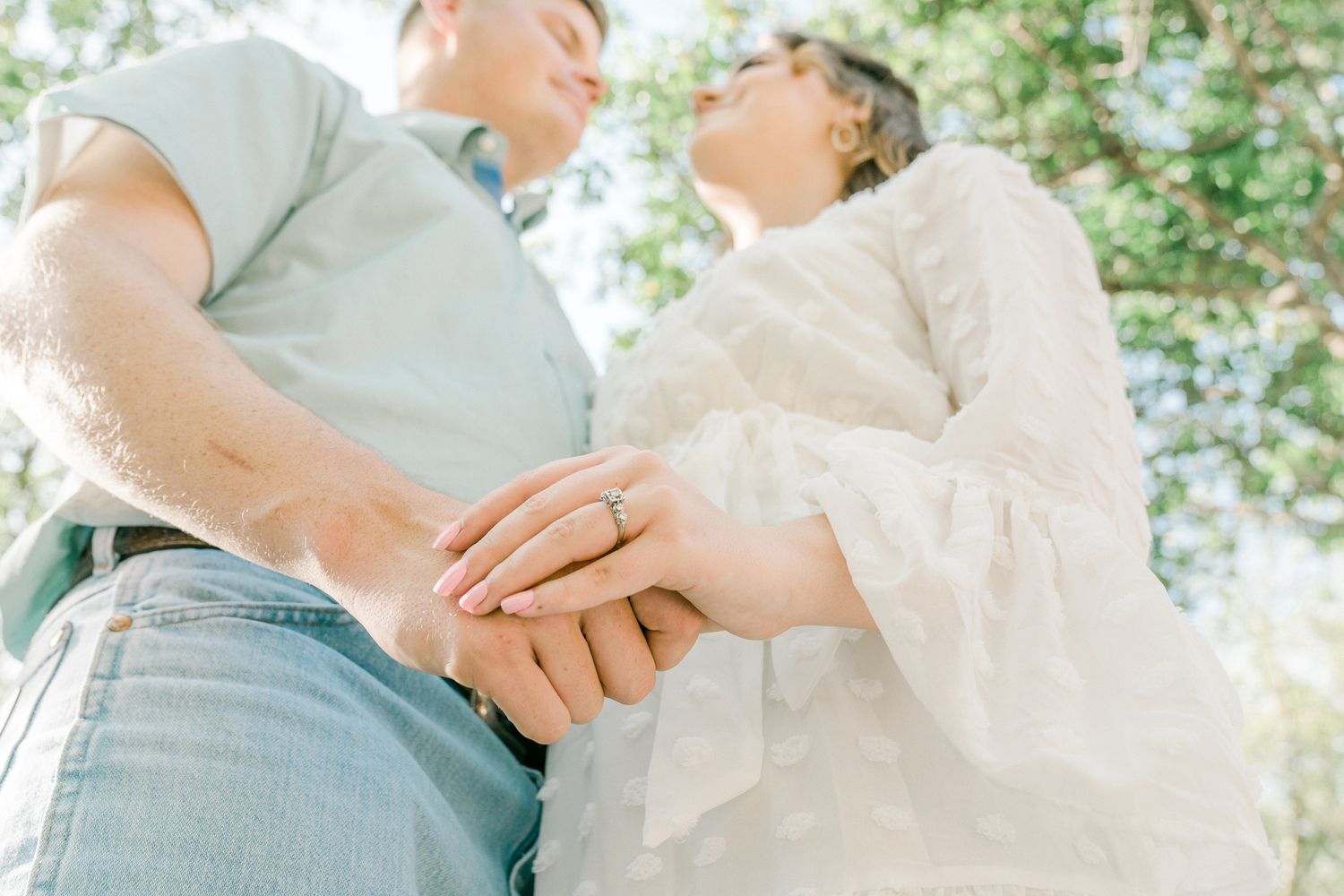 Series of tender moments captured between couple in white and mint green outfits outdoors.