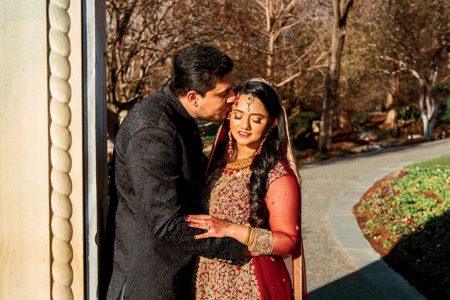 Romantic sequence of a couple in traditional attire sharing intimate moments outdoors.