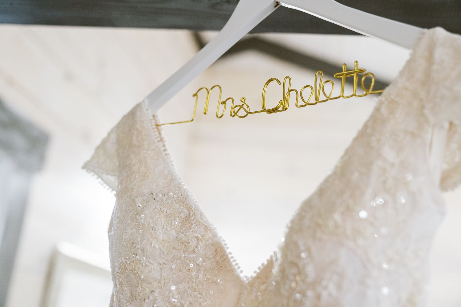 Sparkling quartz crystal clusters with iridescent rainbow reflections displayed against a dark background.
