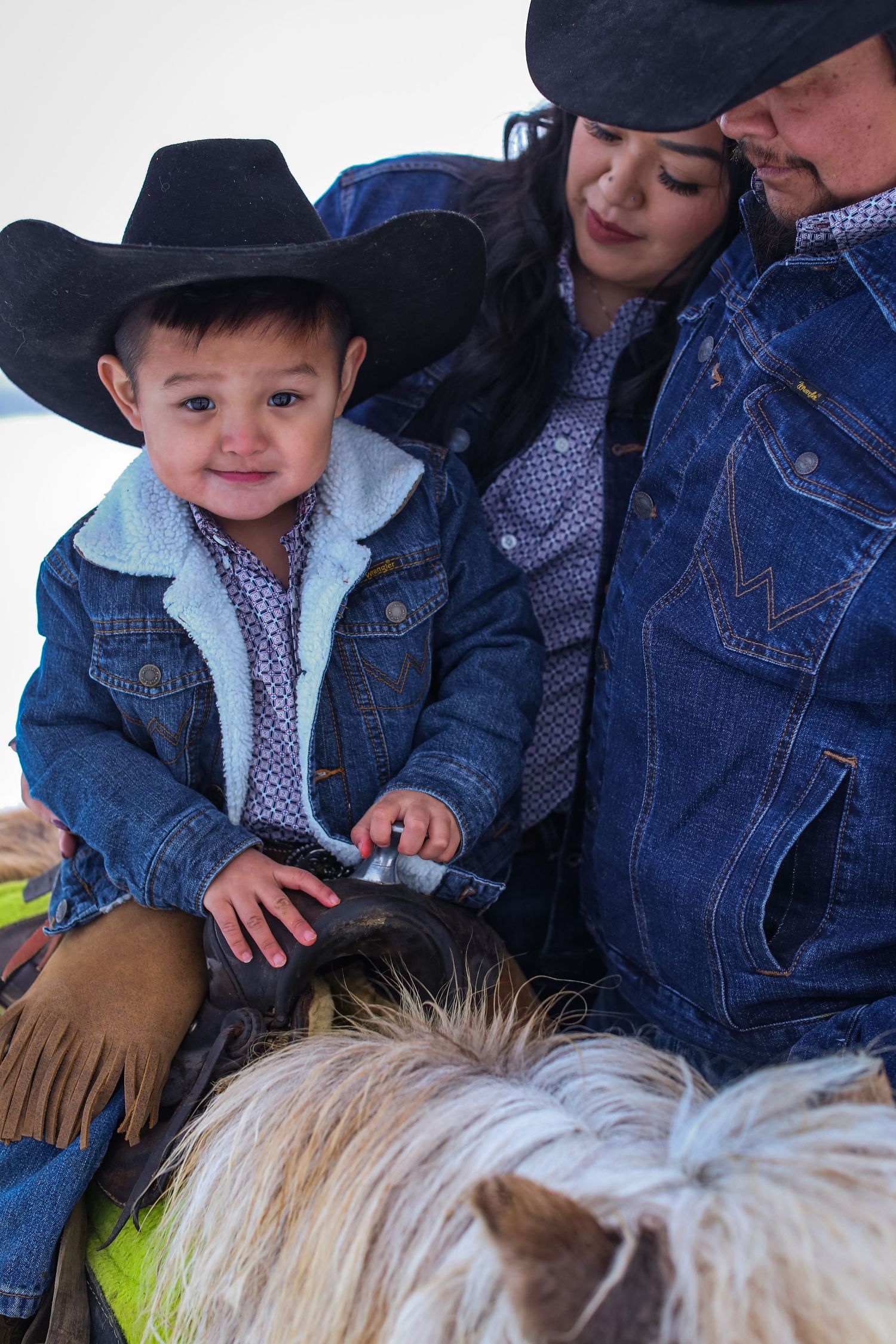 family-of-three-in-snow-bend-oregon