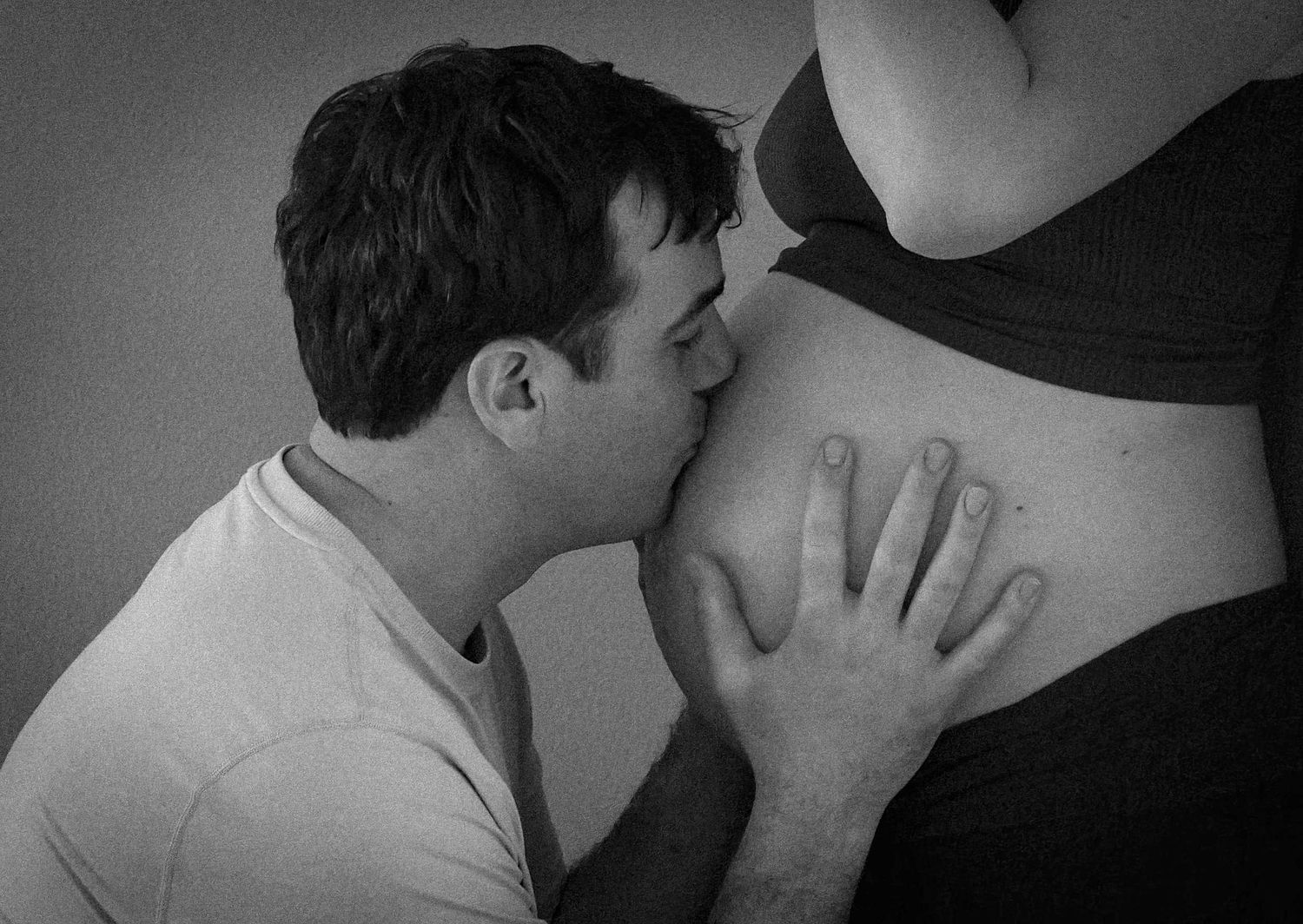 Black and white artistic photo series showing intimate romantic moments between a couple in close embrace.