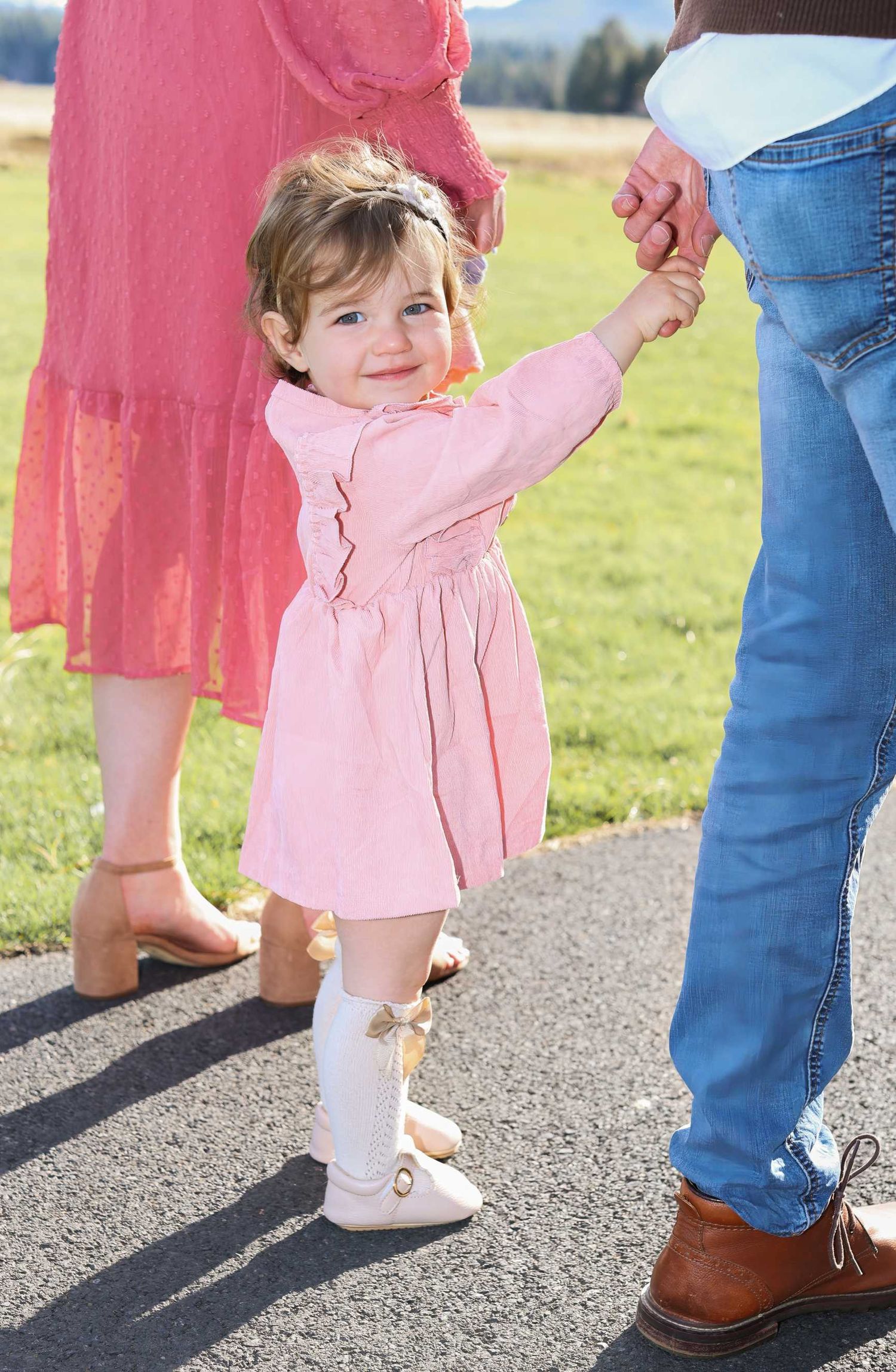 A series of photos showing feet walking on a path, with pink clothing and brown boots visible.