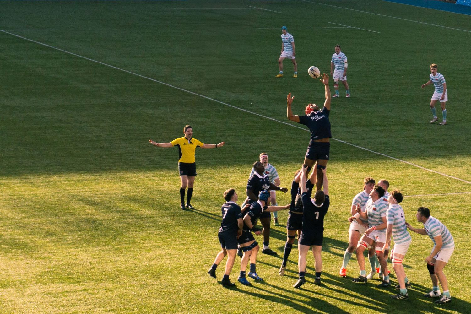Rugby player catching the ball in the line-up at the StoneX Stadium, North London during the Oxford V Cambridge varsity match