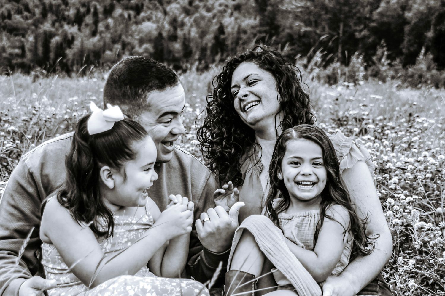Family laughing and enjoying eachother during an outdoor family session in Alaska - candid moments captured by Lucky River Photography