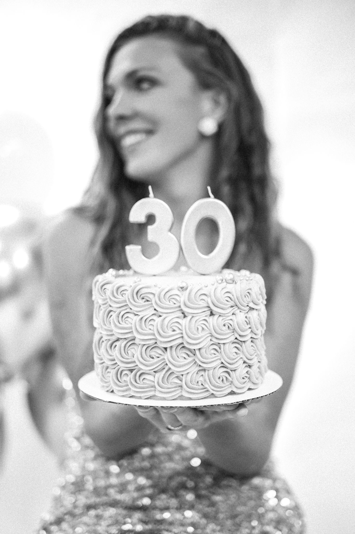 A series of white birthday cakes with the number 30 on top shown in a creative photo collage. photo, Great Falls, MT
