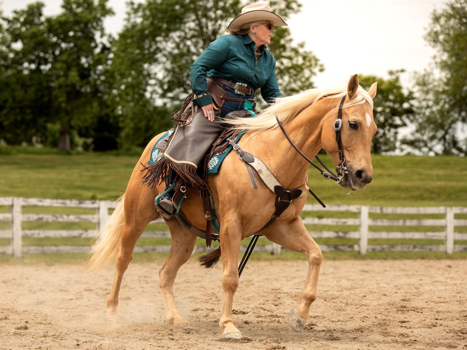 cowgirl riding horse