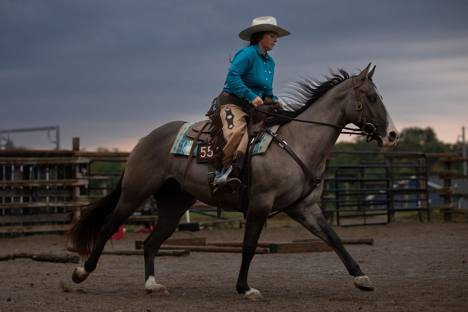cowgirl riding horse