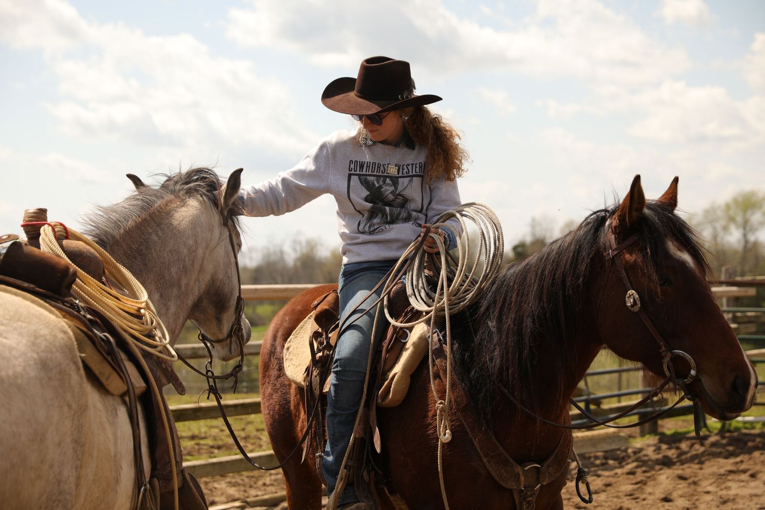 cowgirl and horses