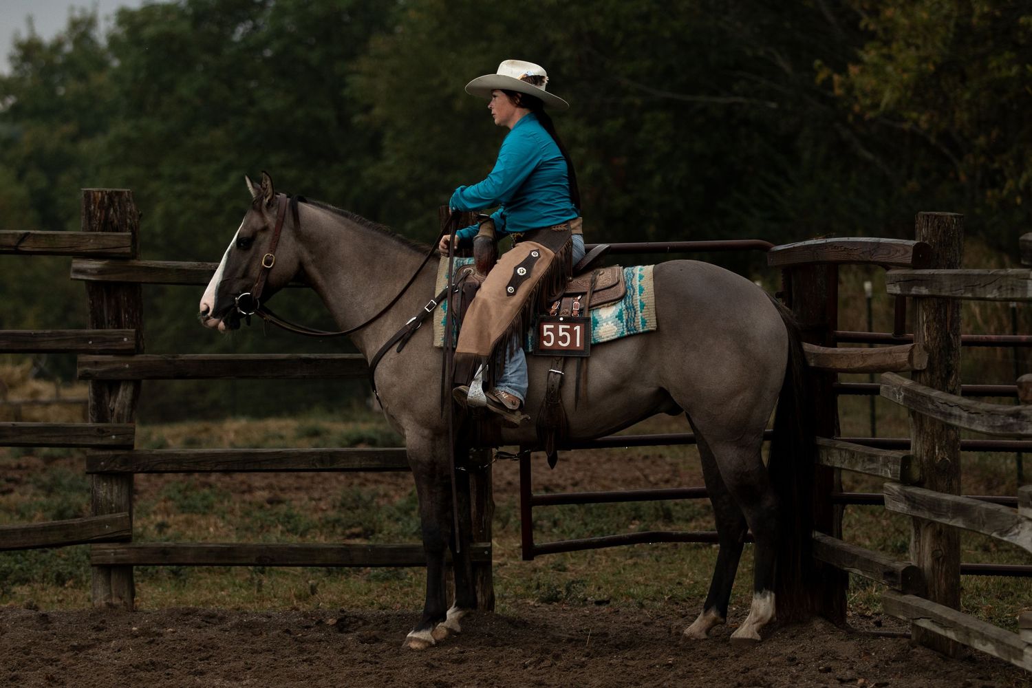 cowgirl riding horse