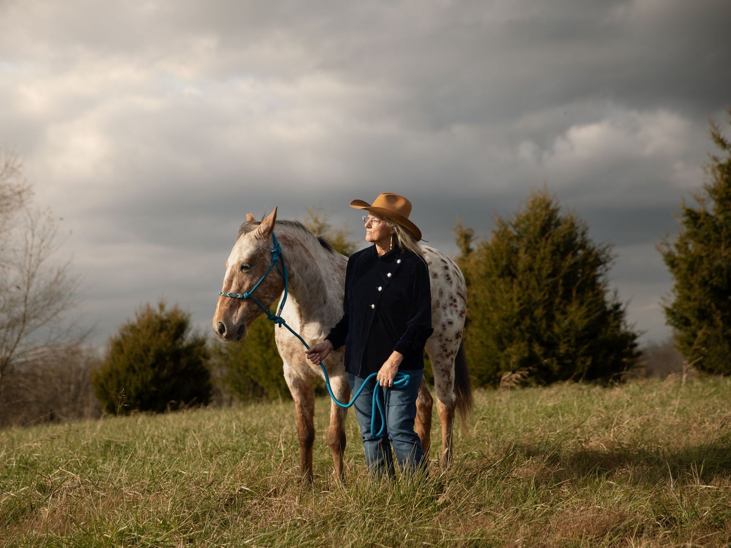 woman and horse golden hour
