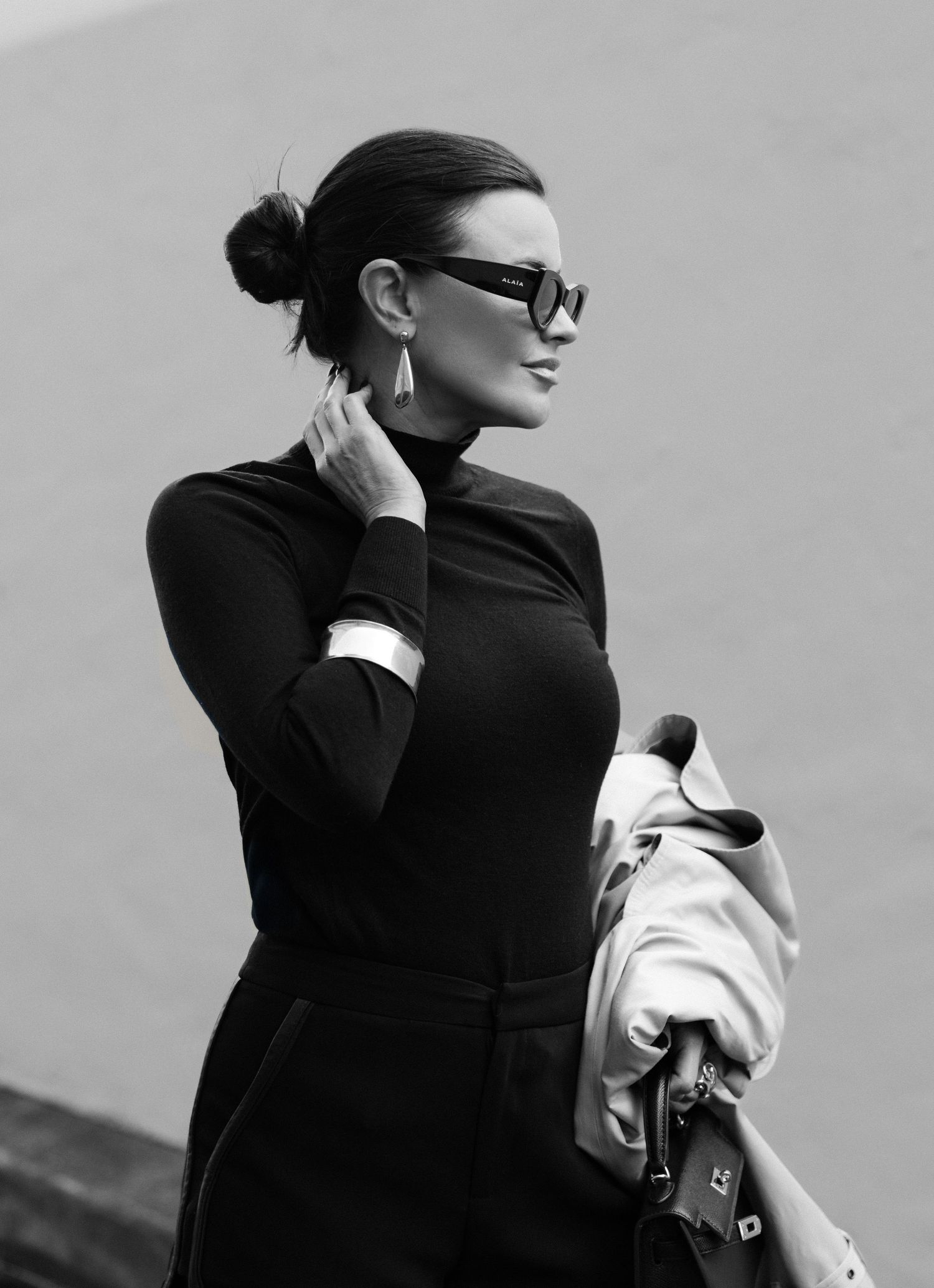Series of black and white photos showing a person in athletic wear against a minimalist background.