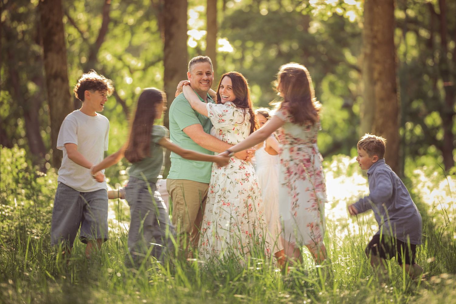 A sequence of outdoor family photoshoot moments in a sun-dappled wooded area taken by Salem, Oregon family photographer.