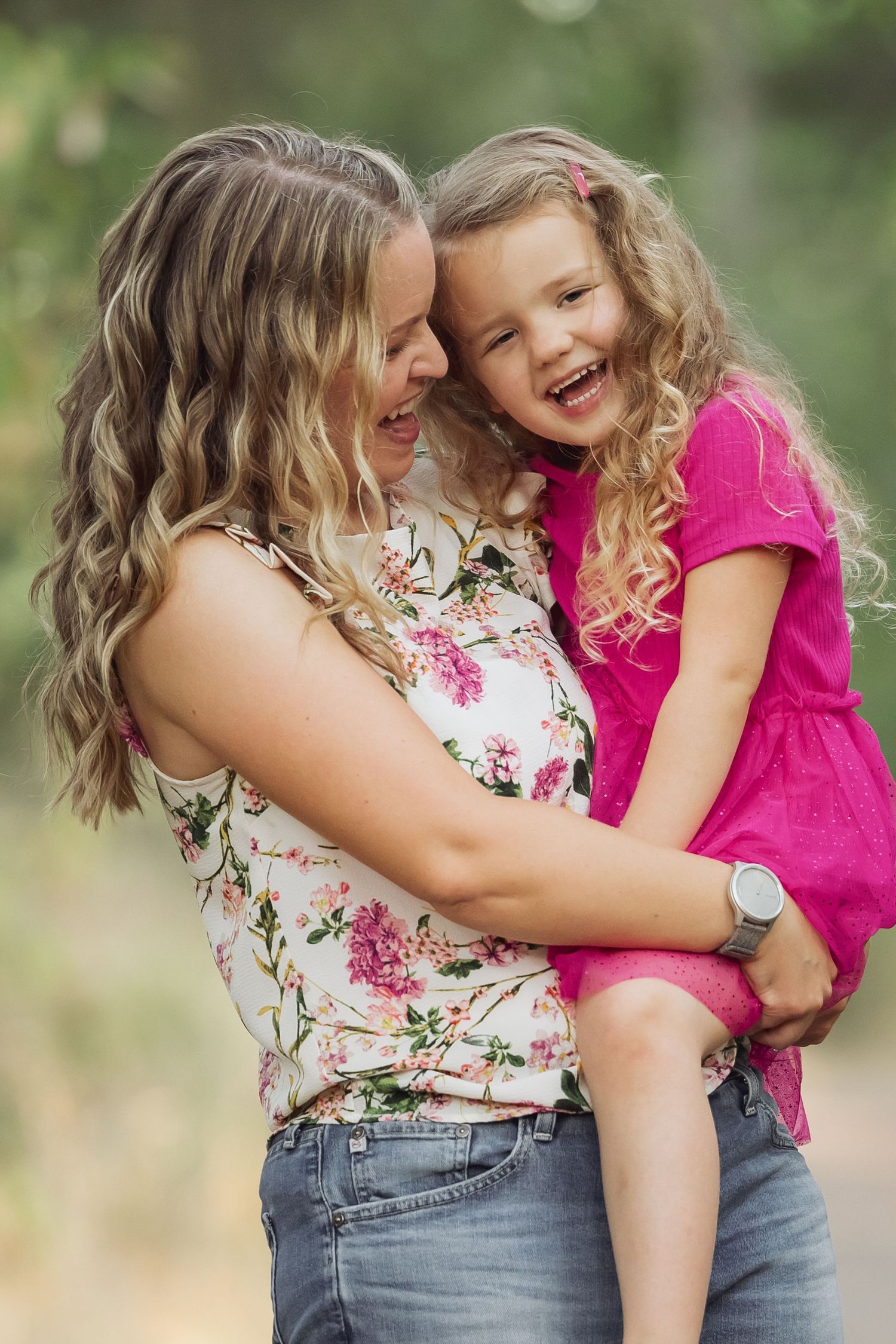 A heartwarming sequence of candid moments showing a parent and child embracing and laughing together outdoors.