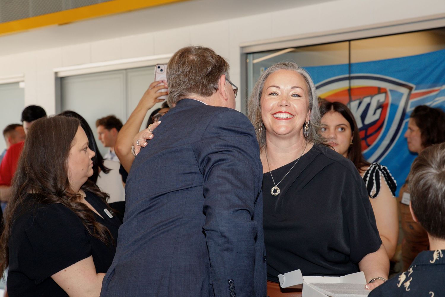 Event Photography done by Jordan and Kaesha Photography in OKC for Titan Titles Ribbon Cutting Ceromony.