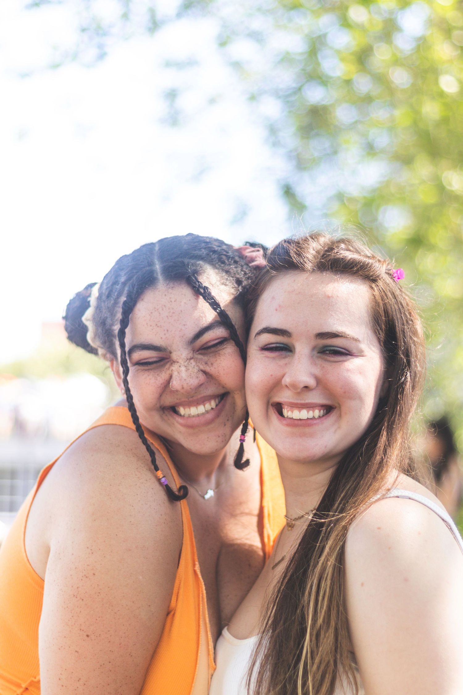 A young queer lesbian couple celebrates pride together.