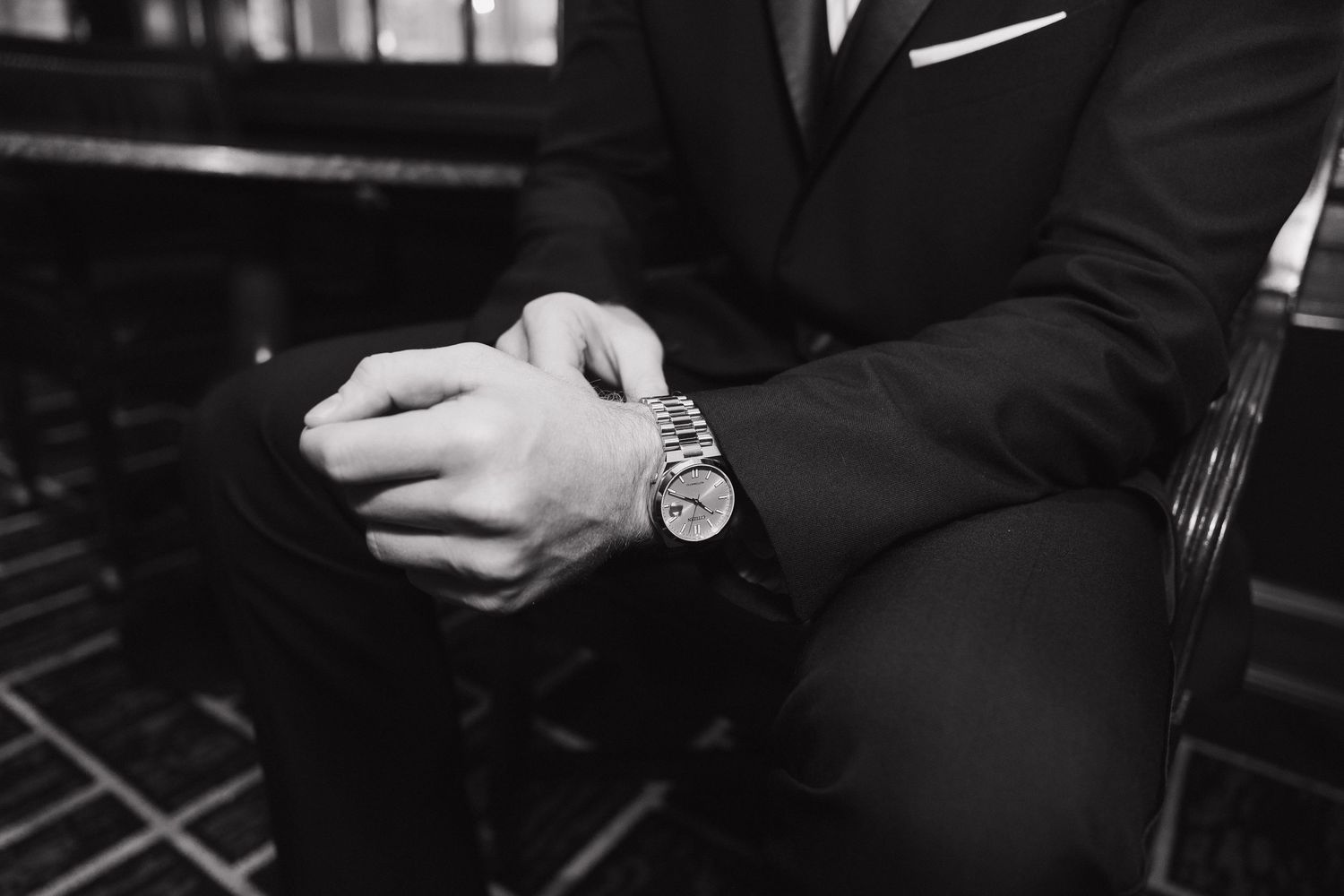 A series of black and white photos showing people in formal attire at what appears to be an elegant event.