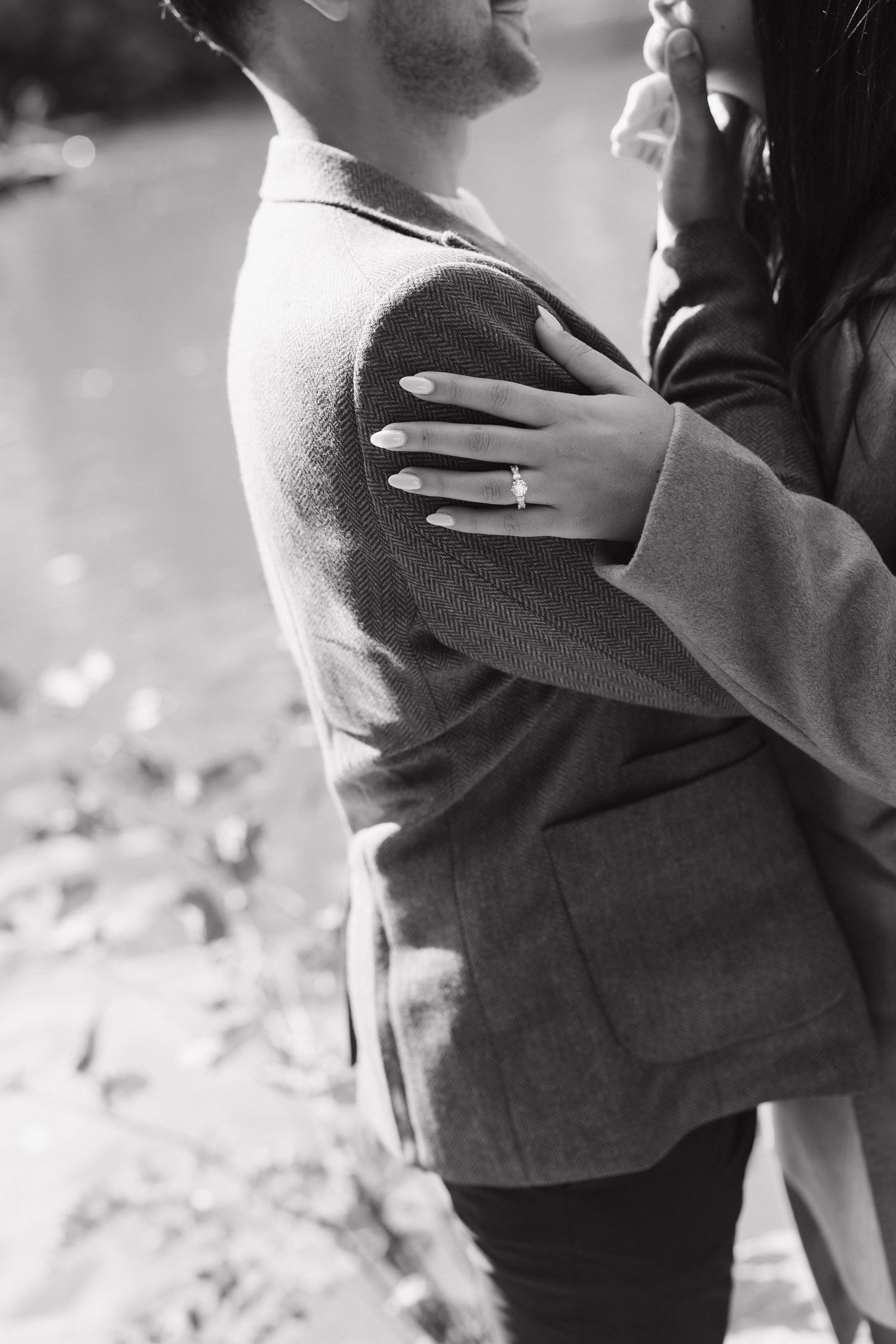 Close-up black and white shots showing tender embraces and intimate moments.