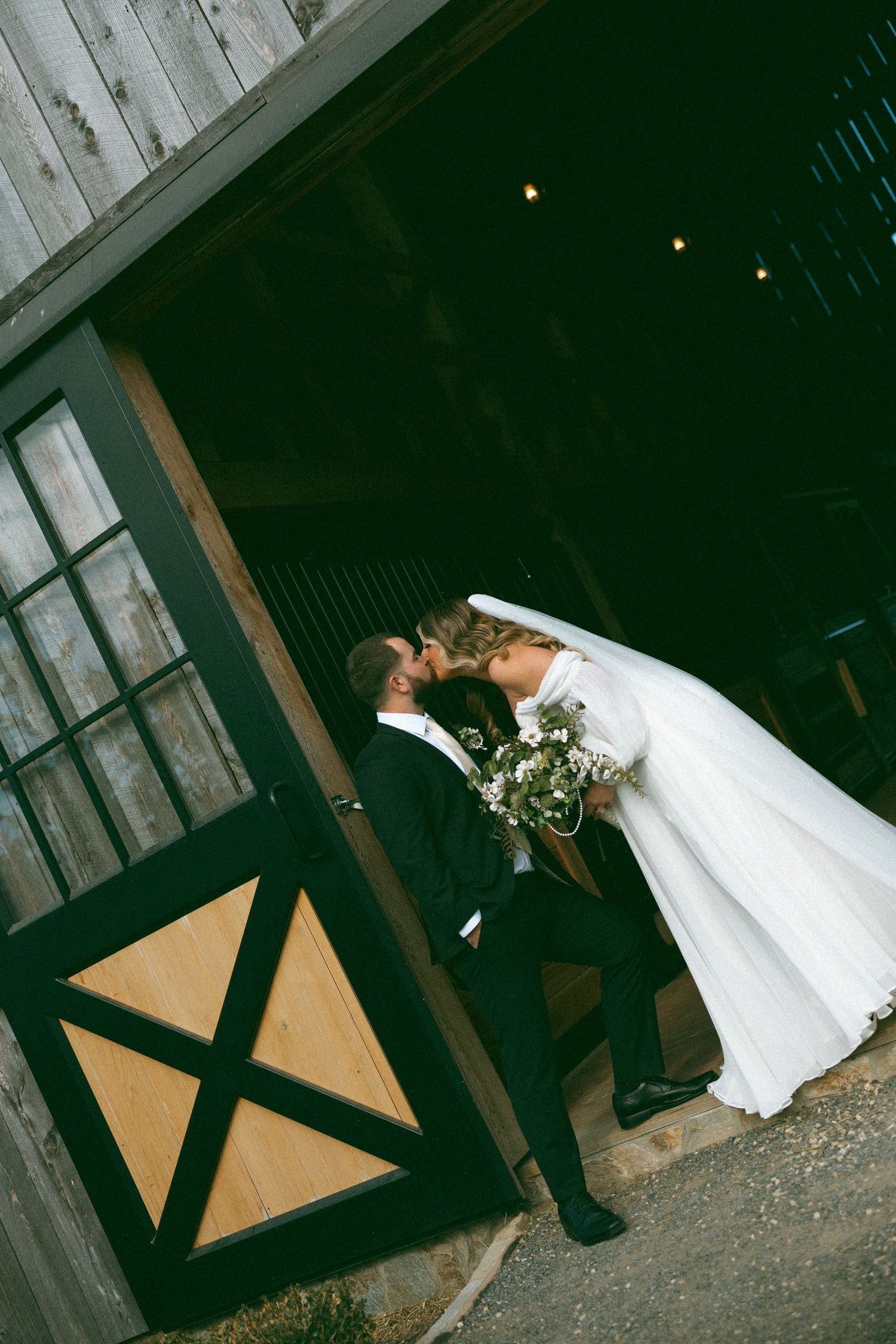 A sequence of romantic outdoor steps with a couple in wedding attire walking down.