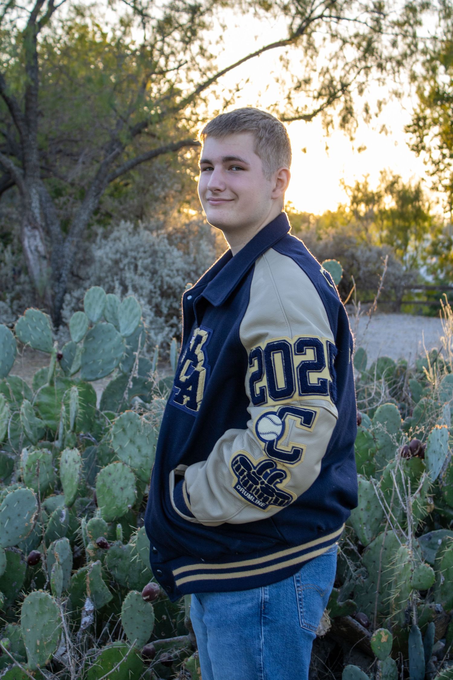 high school senior with letterman