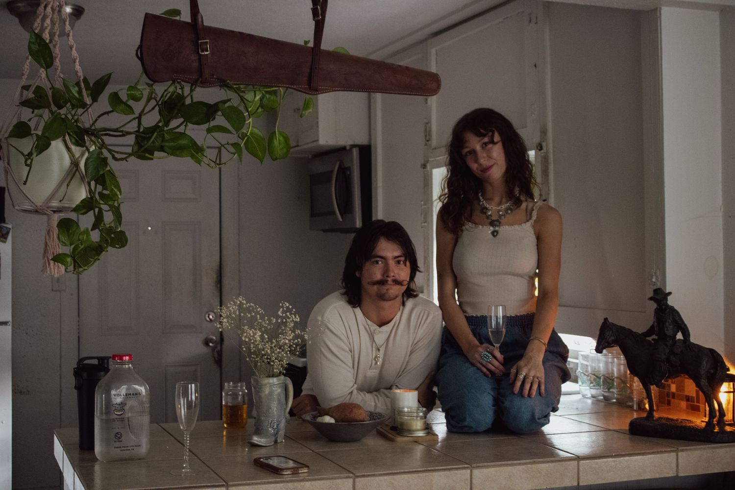 couple sitting at the kitchen counter